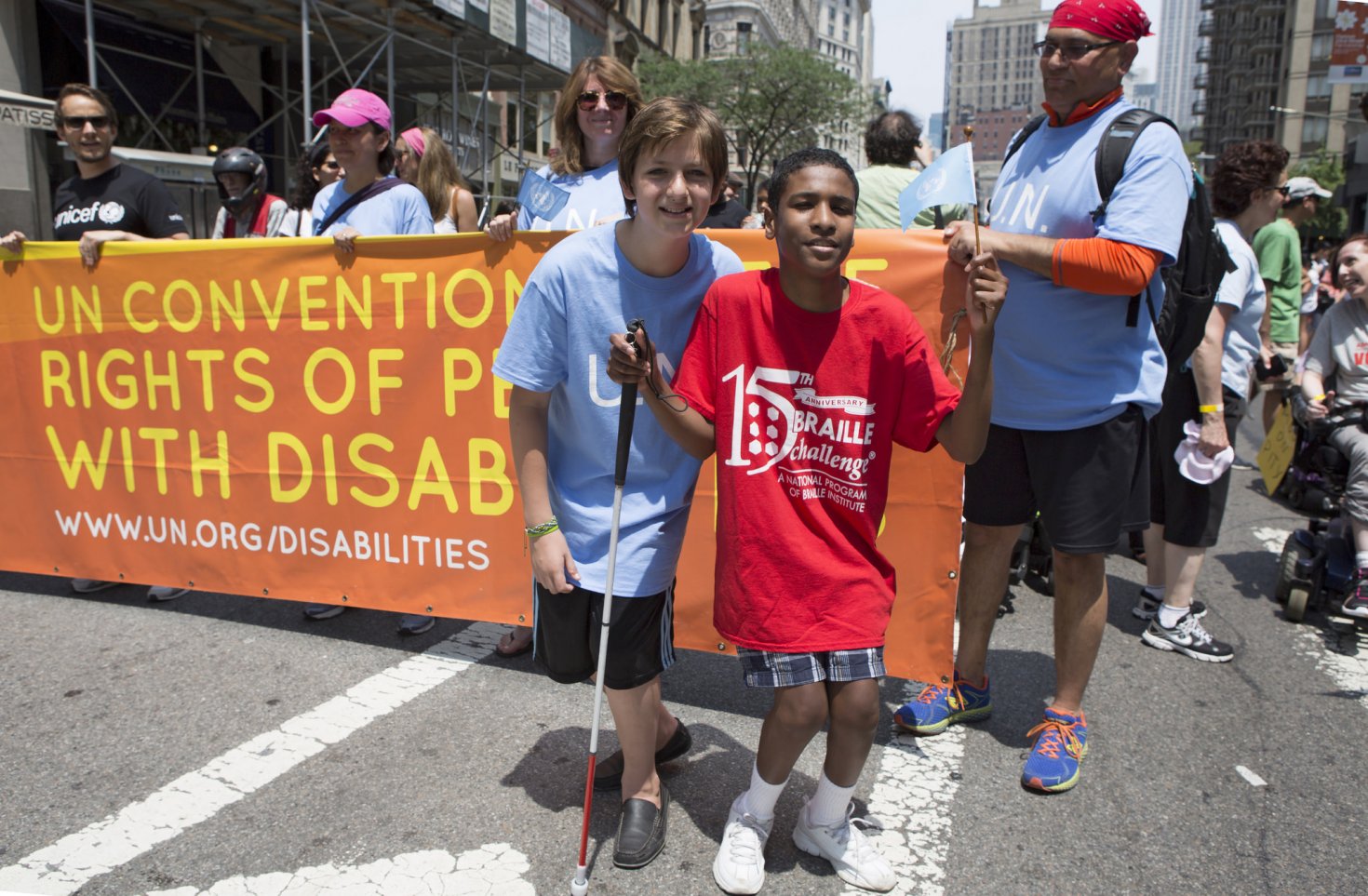 Disabled Teenager marching through the parade Disabled Teenager marching through the parade