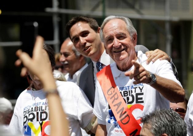 Former Senator Tom Harkin marches in the NYC Disability Pride Parade along with fellow supporters