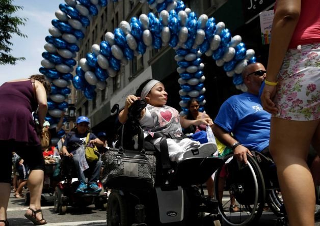 Jessica Lopez, participates in the inaugural Disability Pride Parade, Sunday, July 12, 2015, in New York.