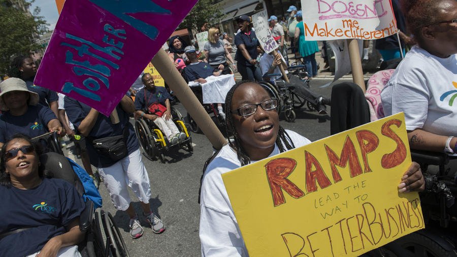 The inaugural Disability Pride Parade travels along Broadway in New York