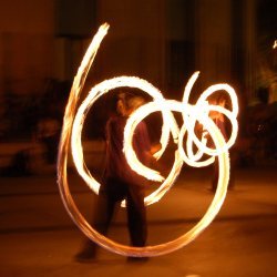Man performs a lightshow Man performs a lightshow