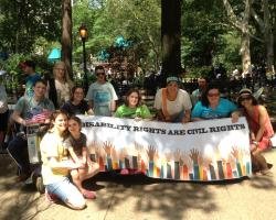 Participants in the parade gather together to march