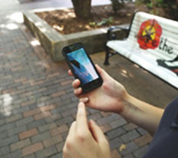 Woman outside with smartphone