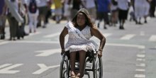 Andrea Dalzell who is the 2015 Ms. Wheelchair New York, participates in the NYC Disability Pride Parade