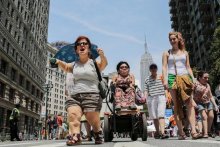 Participants chant in the NYC Disability Pride Parade