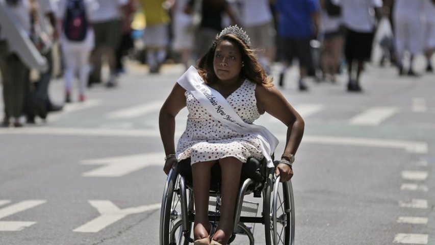 Andrea Dalzell who is the 2015 Ms. Wheelchair New York, participates in the NYC Disability Pride Parade