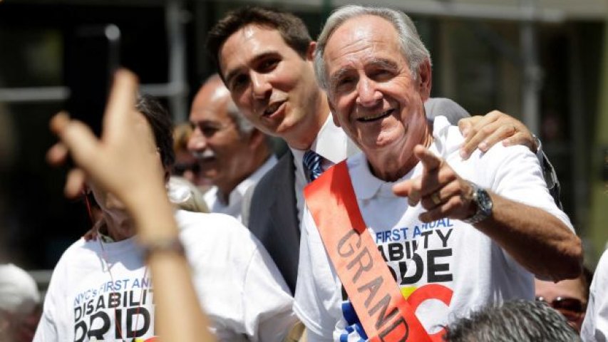 Former Senator Tom Harkin marches in the NYC Disability Pride Parade along with fellow supporters