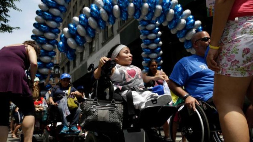 Jessica Lopez, participates in the inaugural Disability Pride Parade, Sunday, July 12, 2015, in New York.