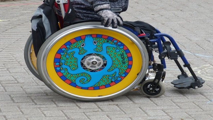 A very artist wheel for a man's wheelchair