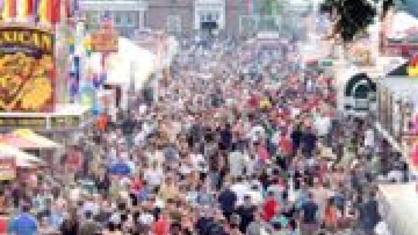 Thousands of people crowded in a street lane