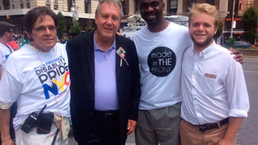 (l-r) Michael Schweinsburg, executive director of the Disability Pride NYC, councilman Danny Dromm, Blake and Brogan McGowen during the parade.