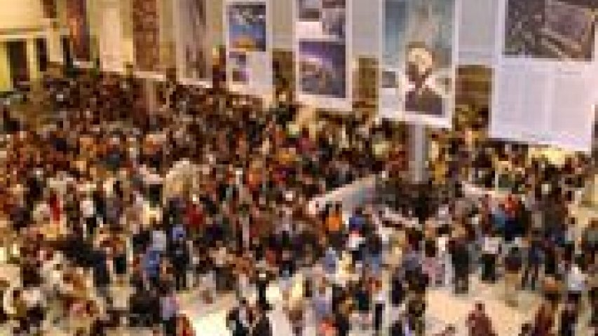 People crowded in a area indoors